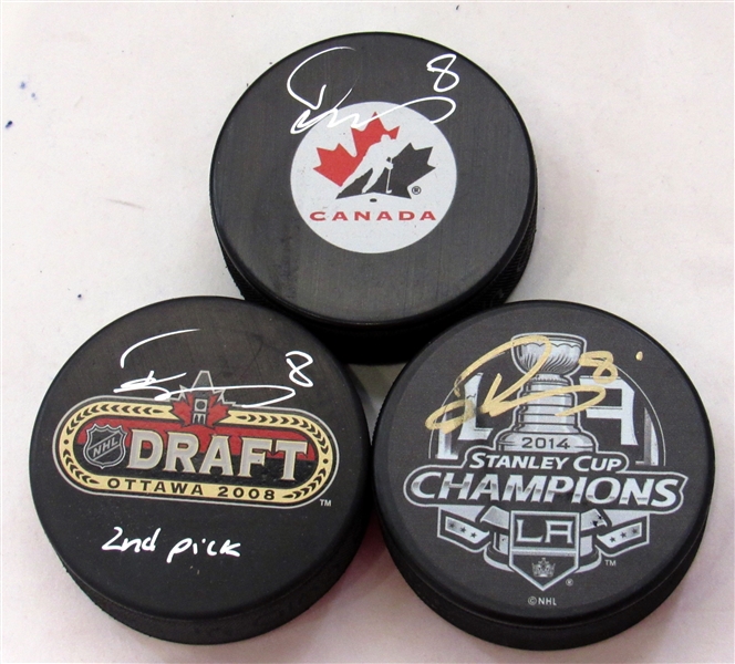 Lot of 3 Drew Doughty Signed Pucks - Kings Stanley Cup, Draft, Team Canada (Flawed)