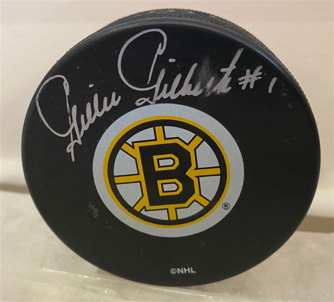 Gilles Gilbert Autographed Boston Bruins Hockey Puck (Flawed)