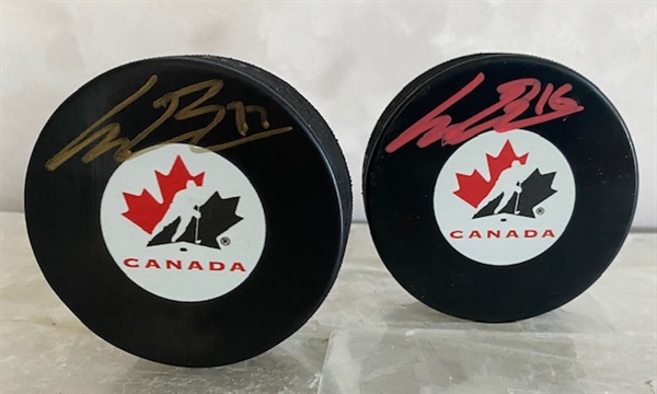 Connor Bedard Team Canada Signed Lot of 2 Pucks - U18 & World Jr