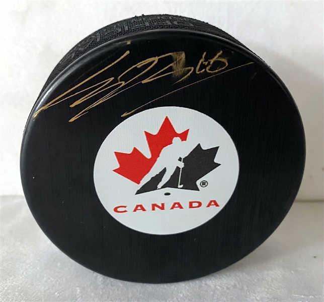 Connor Bedard Team Canada Signed World Juniors Puck (Flawed)