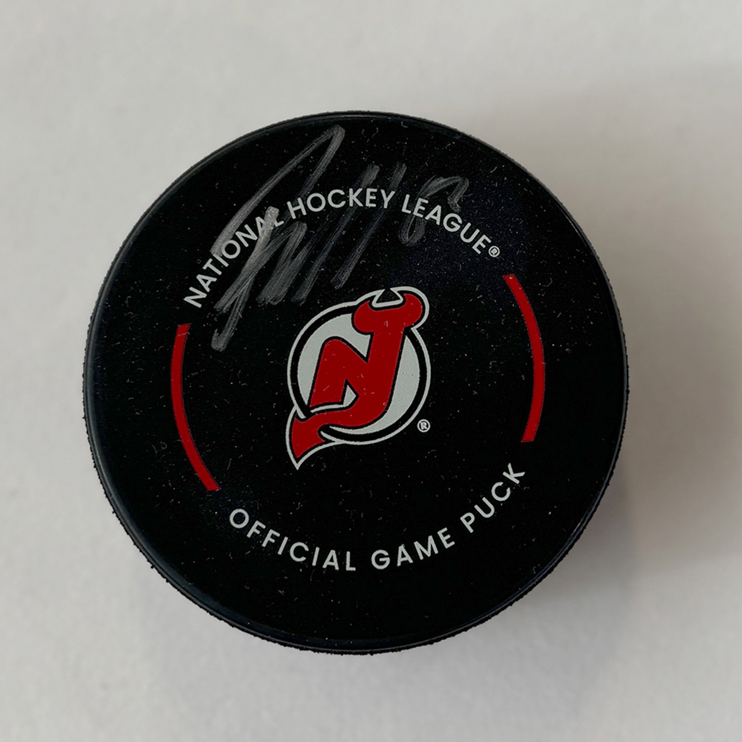 Jesper Bratt Autographed New Jersey Devils Official Game Puck (Flawed)