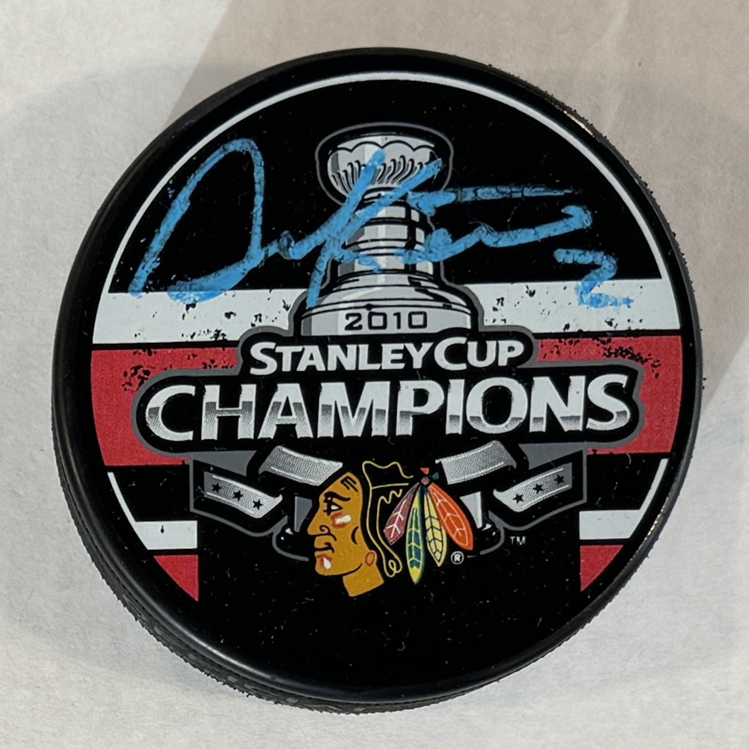 Duncan Keith Autographed Chicago 2010 Stanley Cup Puck (Flawed)