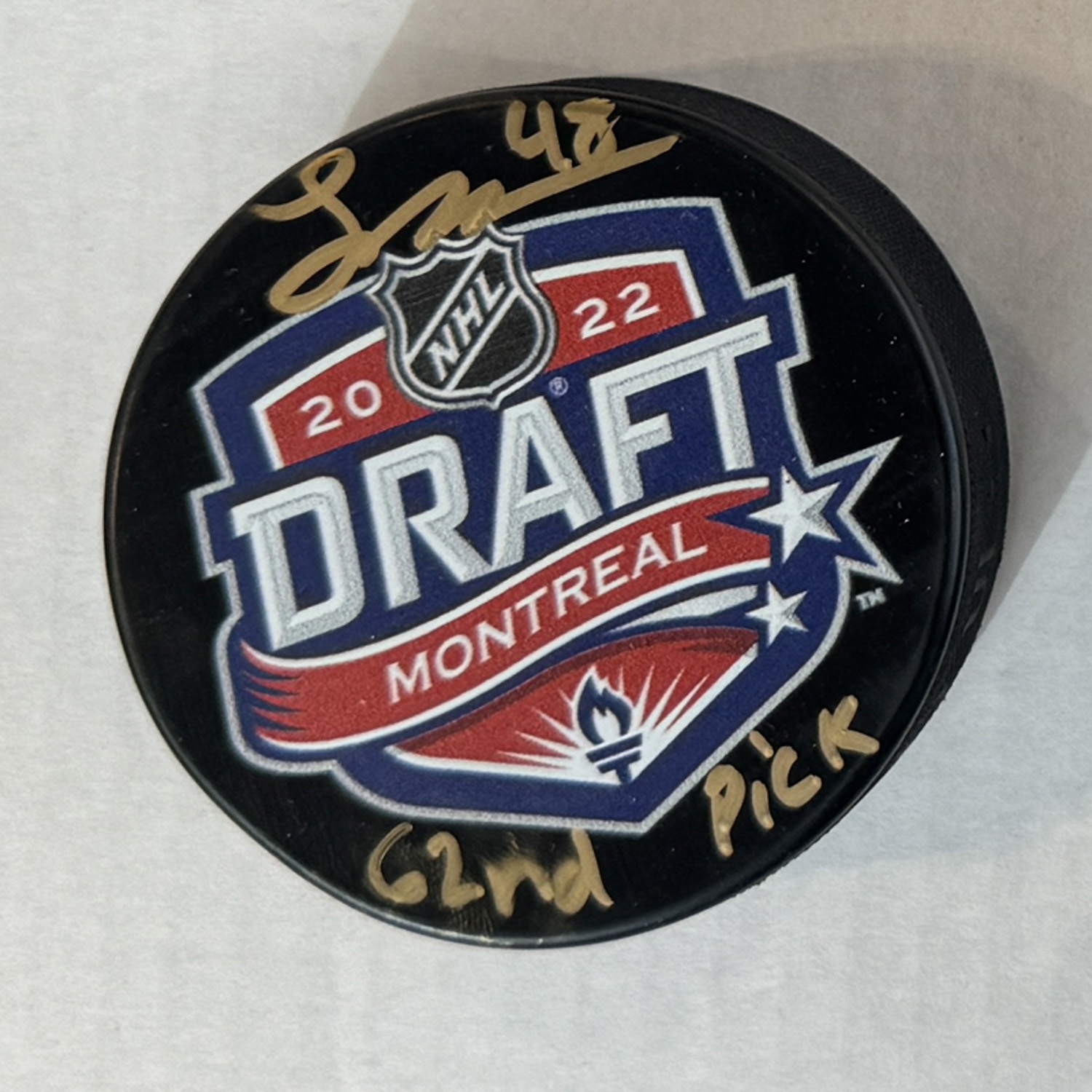 Lane Hutson Autographed 2022 Draft Day Puck with 62nd Pick Note (Flawed)