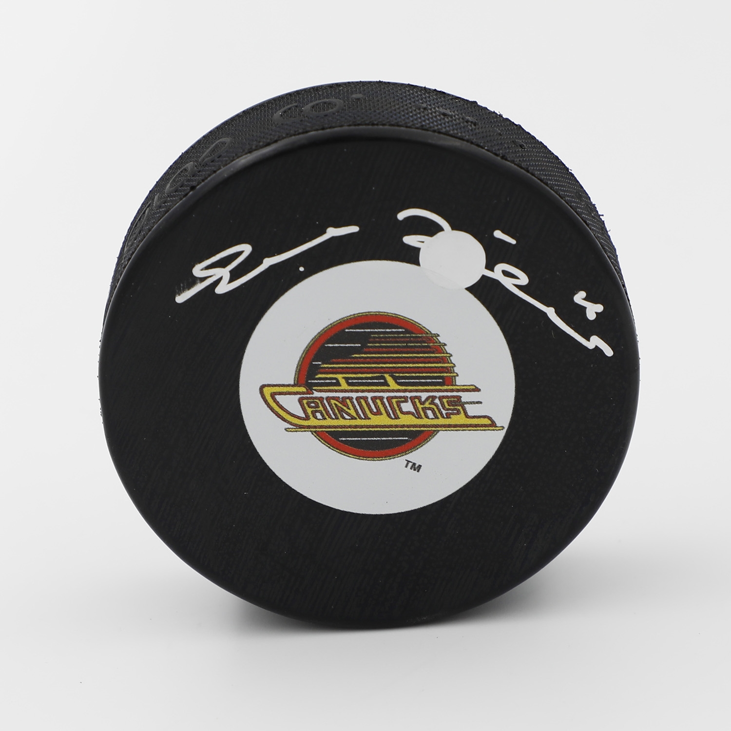 Trevor Linden Autographed Vancouver Canucks Retro Logo Puck (Flawed)