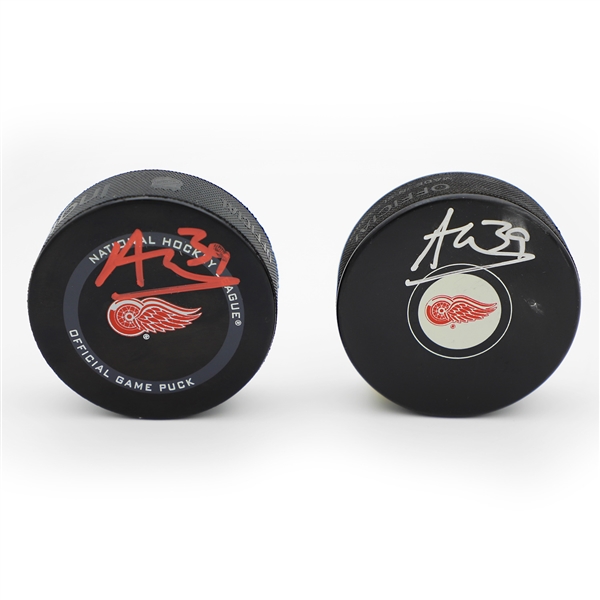 Lot Of 2 Alex Nedeljkovic Autographed Detroit Red Wings Hockey Pucks (Flawed)