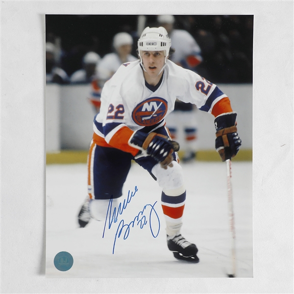 Mike Bossy Autographed New York Islanders Action 8x10 Photo (Flawed)