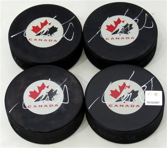 Lot of 4 Aaron Ekblad Team Canada Signed Hockey Pucks (Flawed)