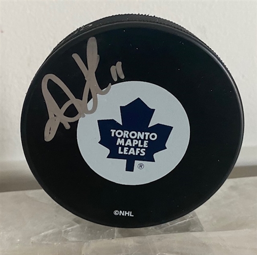 T.J. Ford Former Toronto Raptor Signed Maple Leafs Hockey Puck