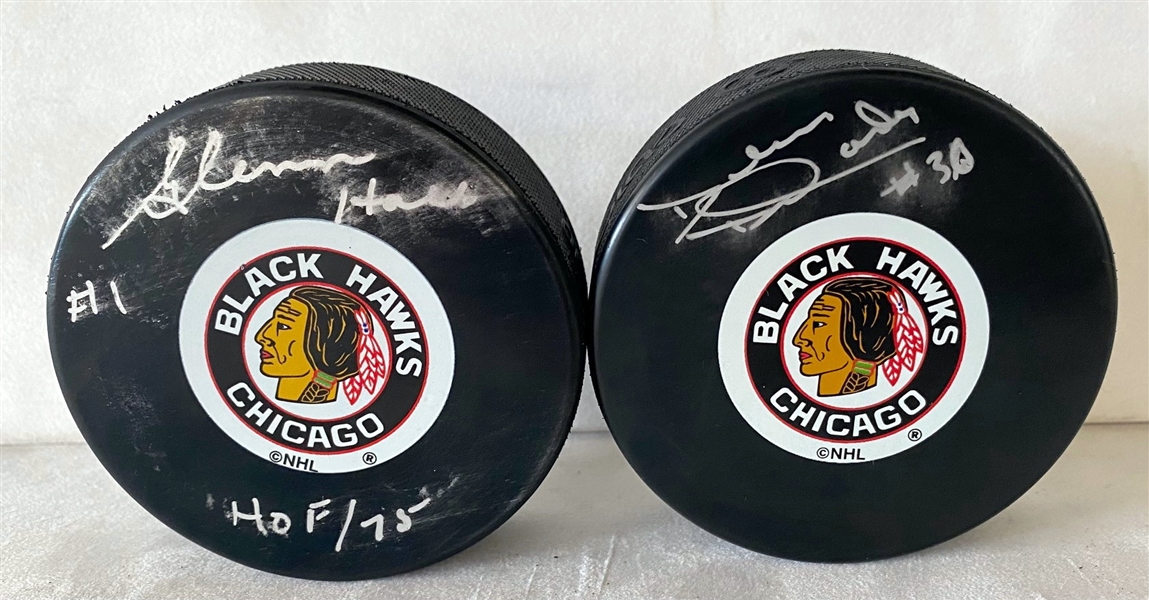 Glenn Hall & Denis Dejordy Signed Lot of 2 Chicago Blackhawks Hockey Pucks (Flawed)