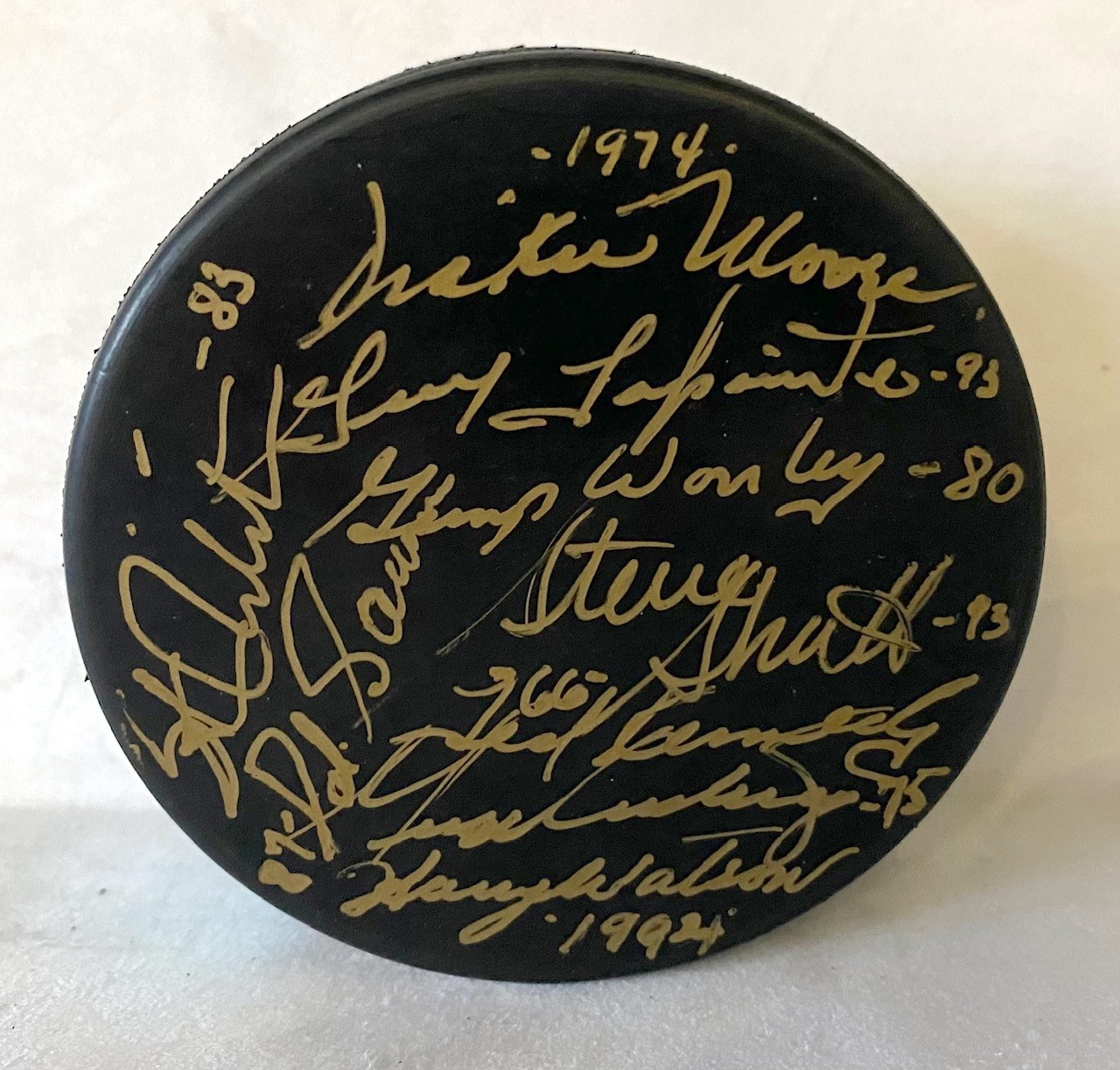 Hockey Hall of Fame Puck Signed by 9 including George Armstrong & Stan Mikita