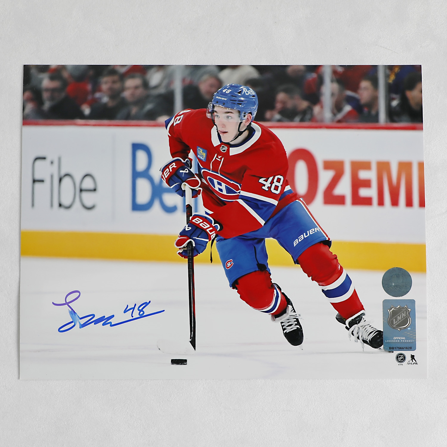 Lane Hutson Autographed Montreal Canadiens Stickhandling 8x10 Photo (Flawed)