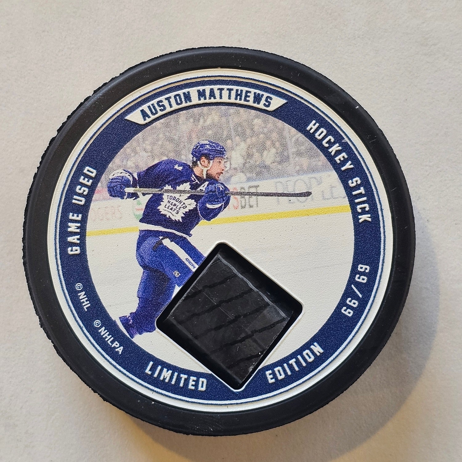 Auston Matthews Authentic Game Used Hockey Stick Collector Puck #66/69