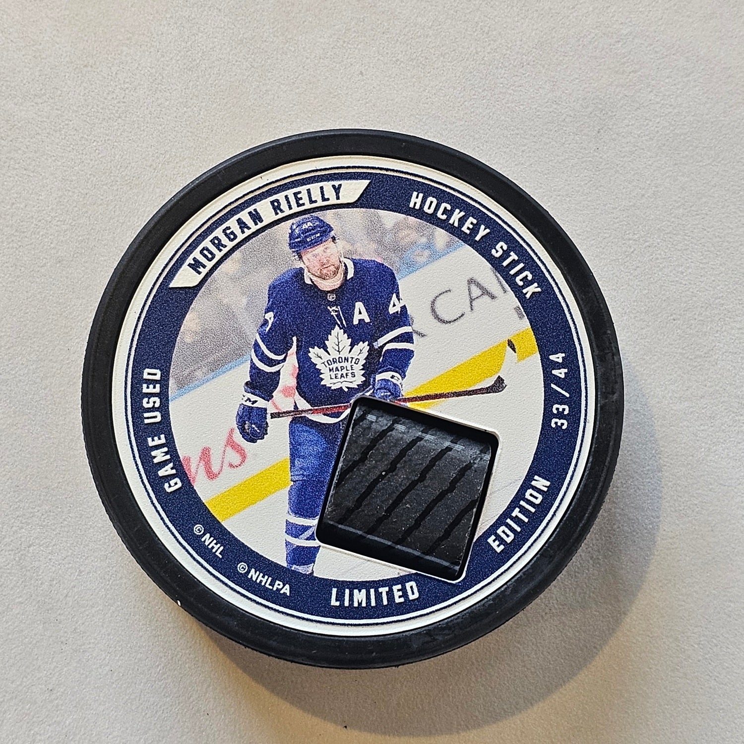 Morgan Rielly Authentic Game Used Hockey Stick Collector Puck #33/44