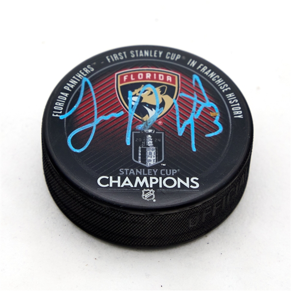 Sam Reinhart Signed Florida Panthers 2024 Stanley Cup Puck (Flawed)