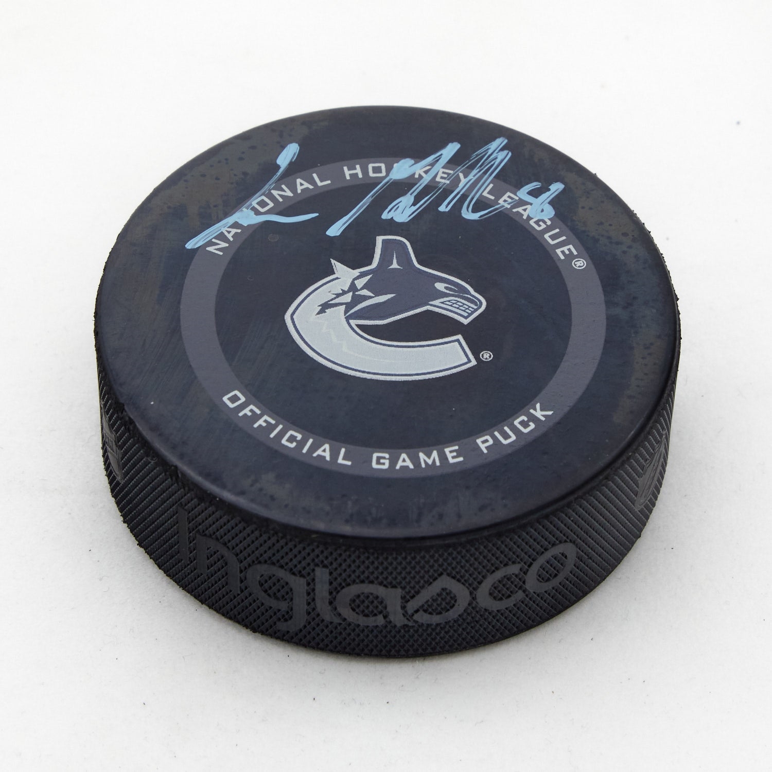 Conor Garland Signed Vancouver Canucks Official Game Puck (Flawed)