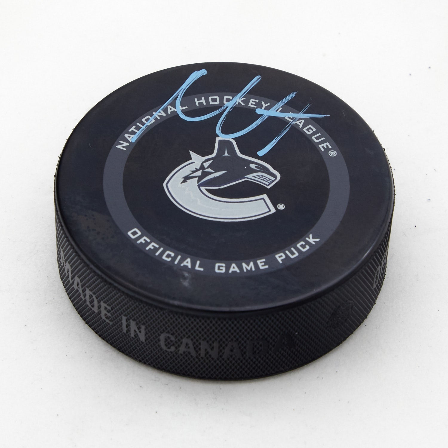 Nils Hoglander Signed Vancouver Canucks Official Game Puck (Flawed)