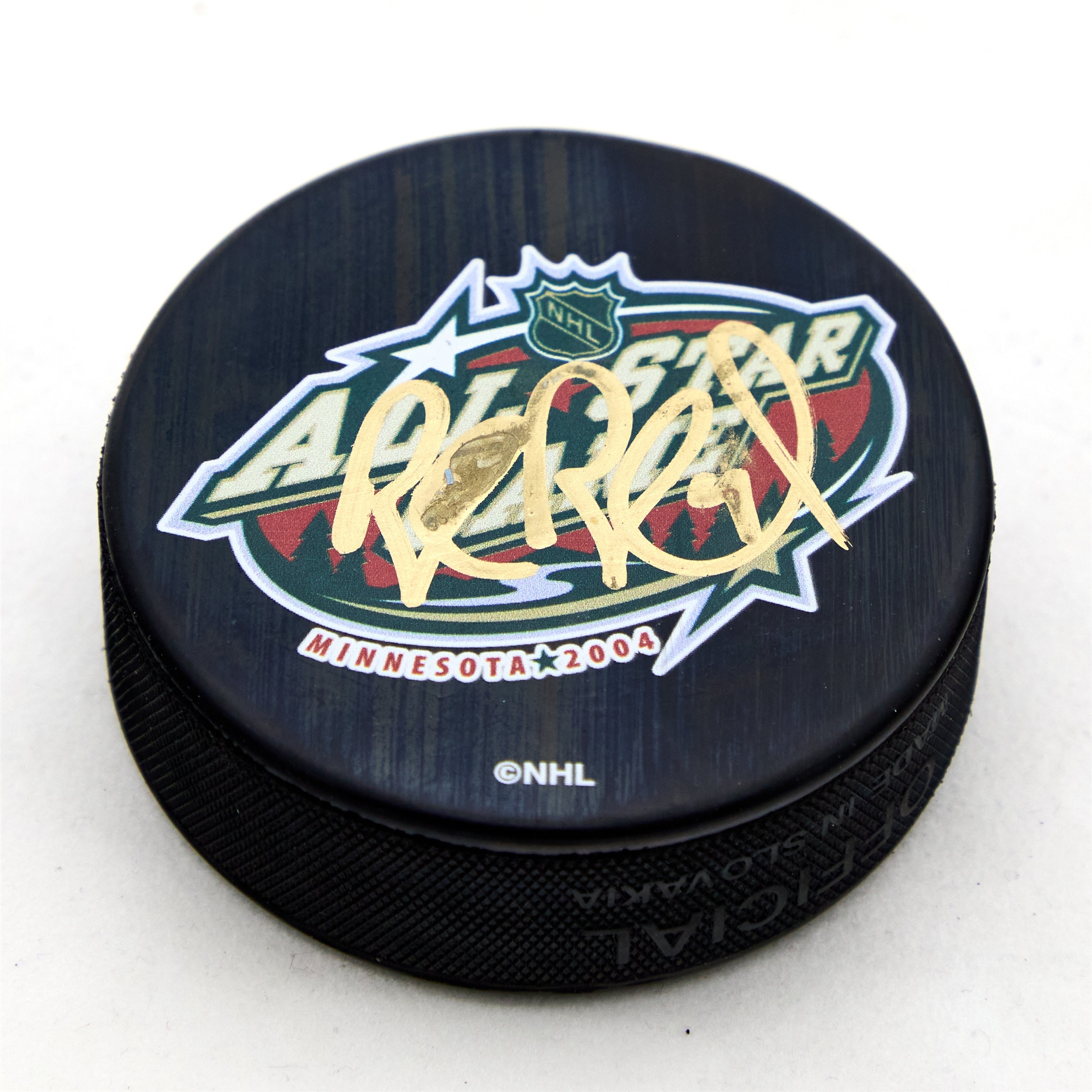 Rob Blake Signed 2004 NHL All-Star Game Hockey Puck (Flawed)