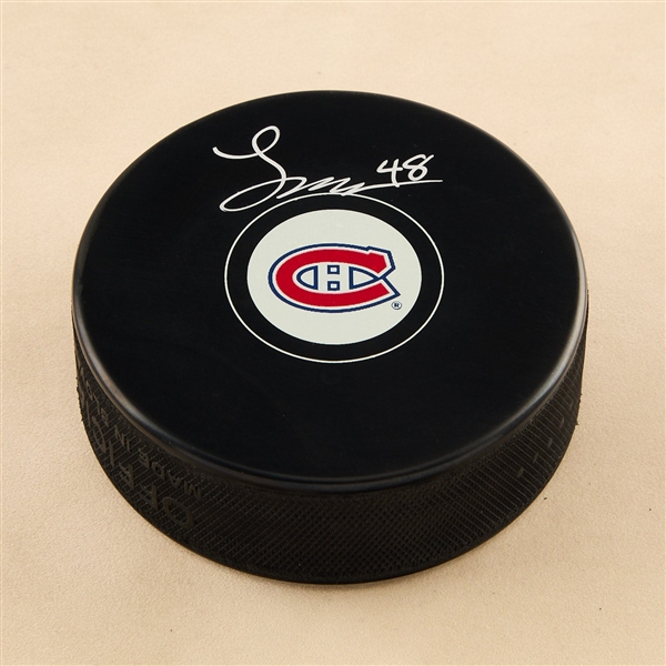 Lane Hutson Autographed Montreal Canadiens Hockey Puck