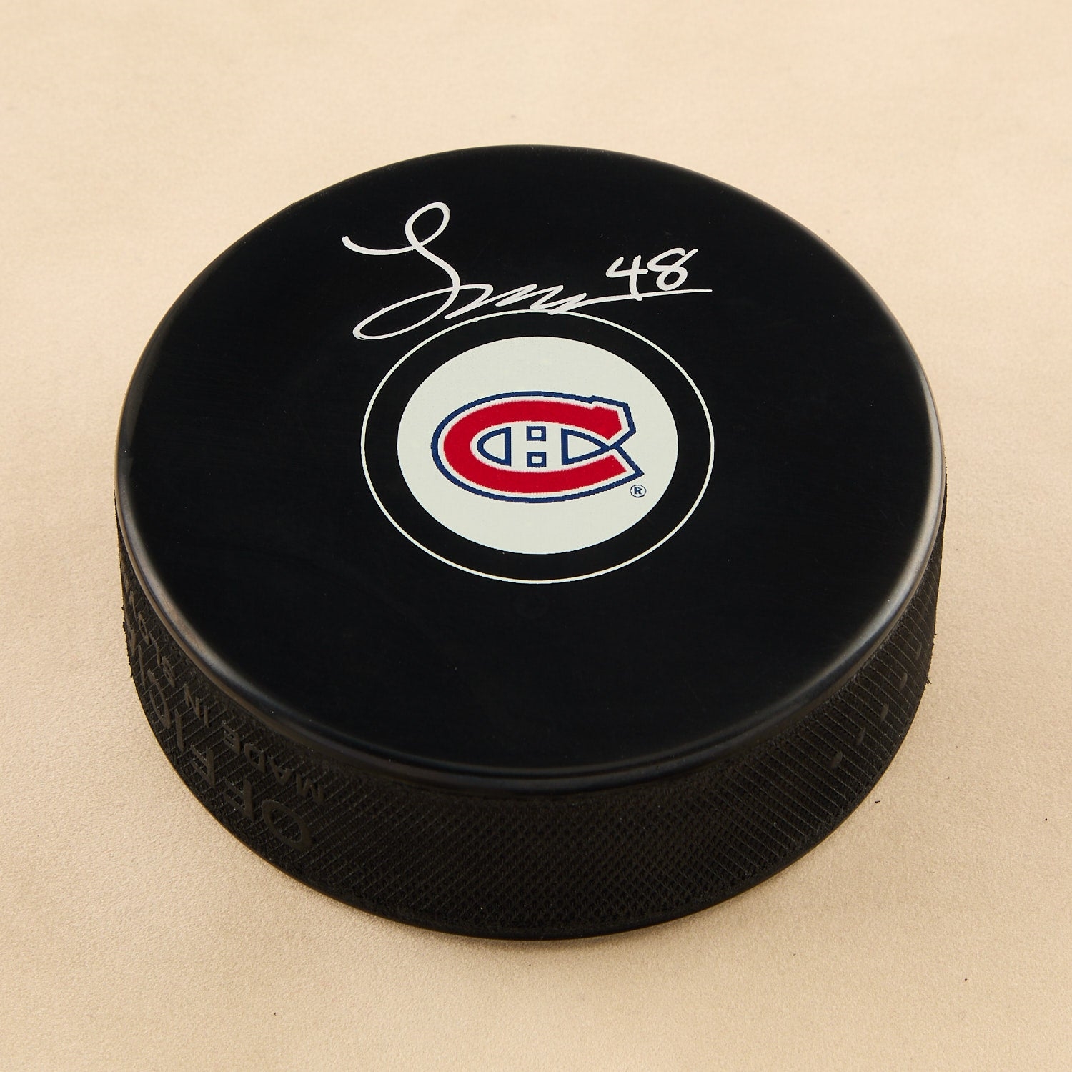 Lane Hutson Autographed Montreal Canadiens Hockey Puck