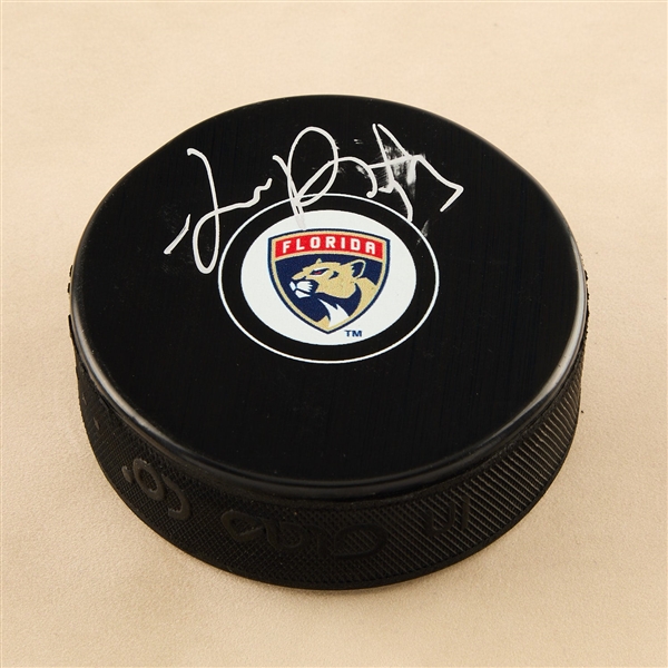 Sam Reinhart Autographed Florida Panthers Hockey Puck (Flawed)