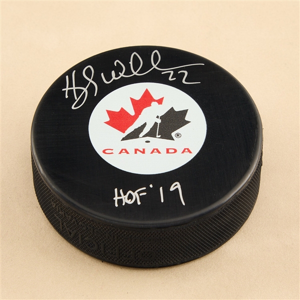 Hayley Wickenheiser Autographed Team Canada Hockey Puck with HOF Note
