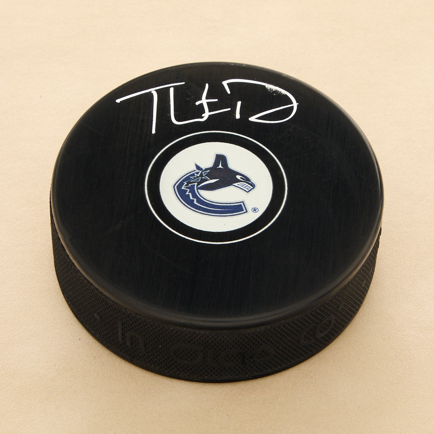 Thatcher Demko Autographed Vancouver Canucks Hockey Puck (Flawed)