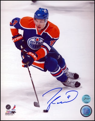Taylor Hall Signed Edmonton Oilers Puck Control 8x10 Photo
